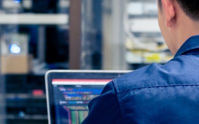 Man typing on computer